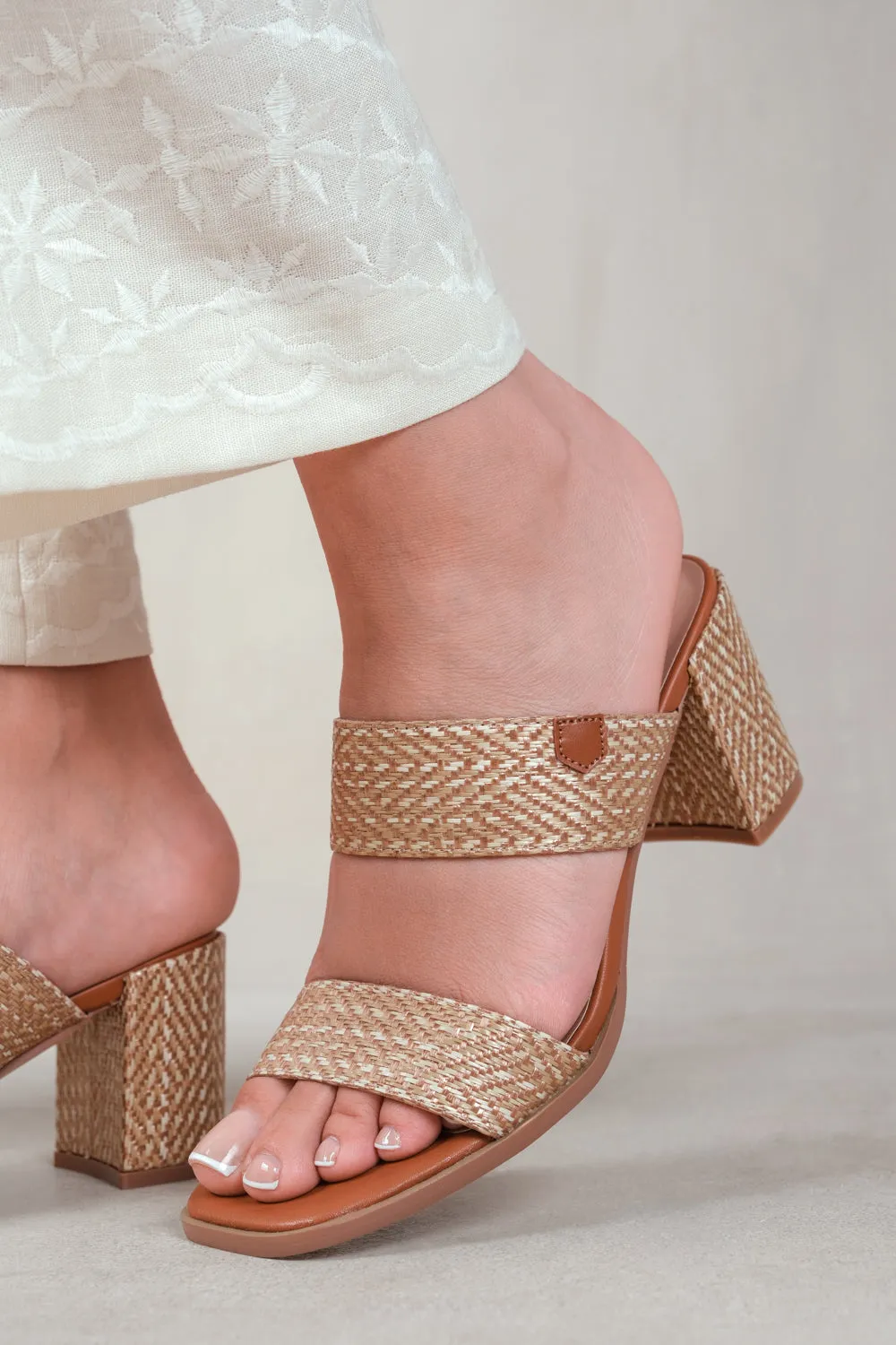 SLAYED STATEMENT PLATFORM STRAPPY BLOCK HIGH HEELS IN NATURAL RAFFIA